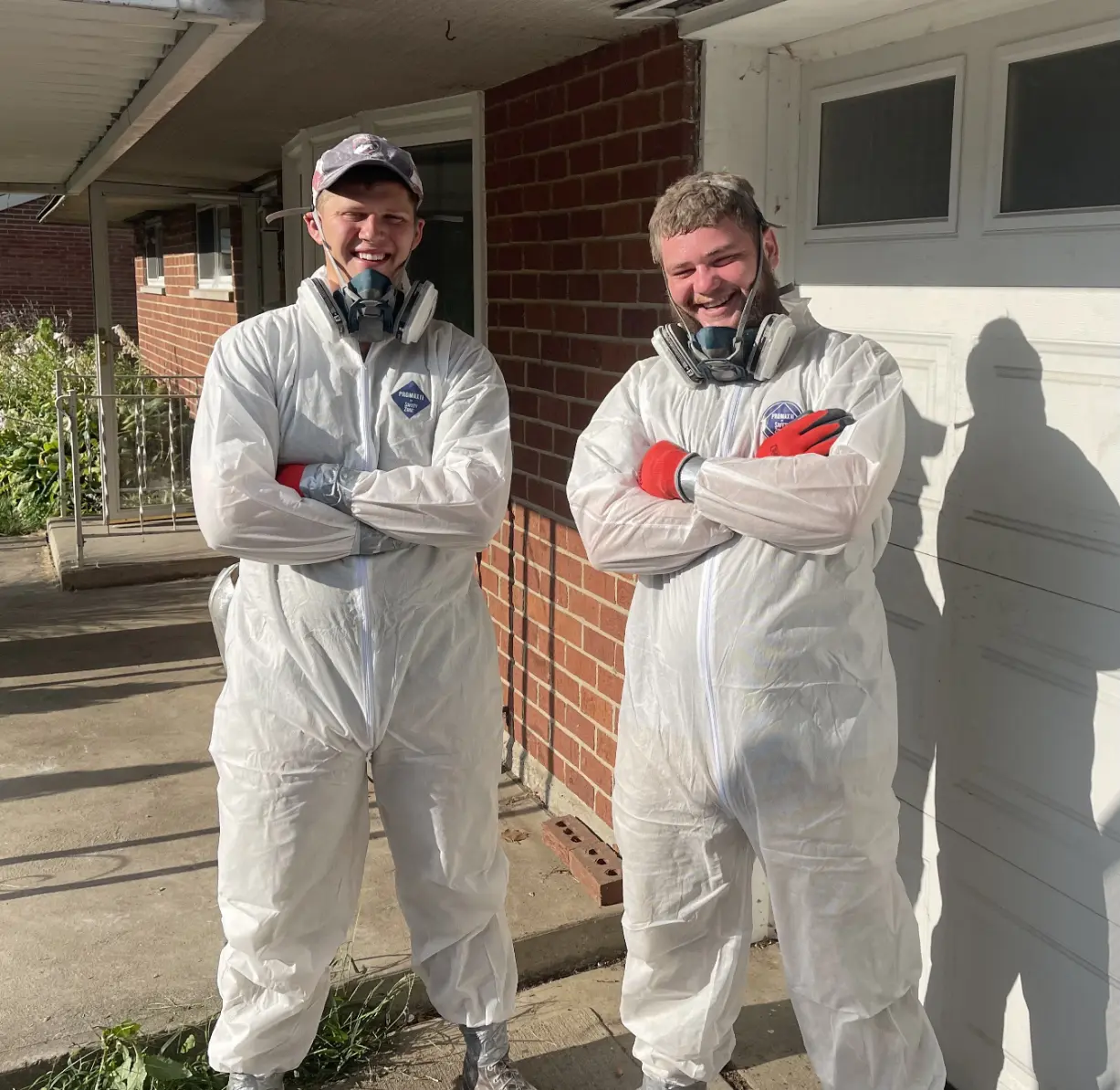 Jireh Junk Removal Crew Wearing Protective Suit